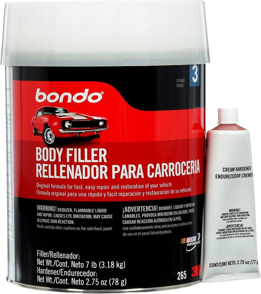 Bondo auto body filler being applied to a vehicle panel during repair